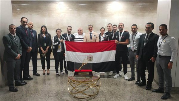 استقبال رسمي لبعثة منتخب الاسكواش في مطار القاهرة بعد الفوز بكأس العالم